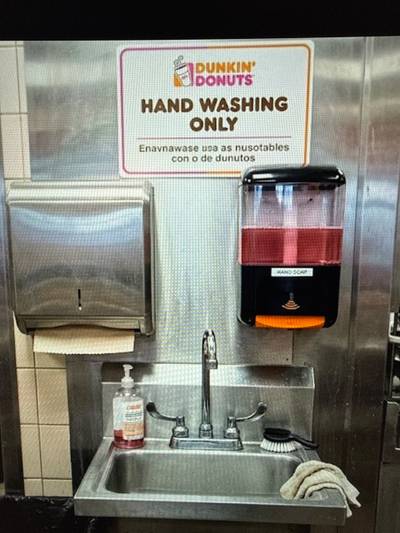 Handwash sink stocked (soap, hot water, signage)?