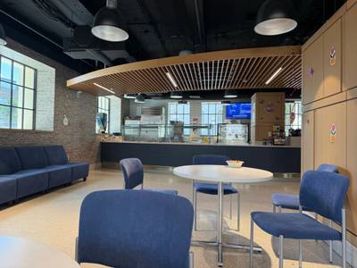 Cafeteria seating area with serving counter