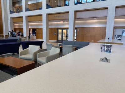Atrium lounge seating with glass guardrails upper