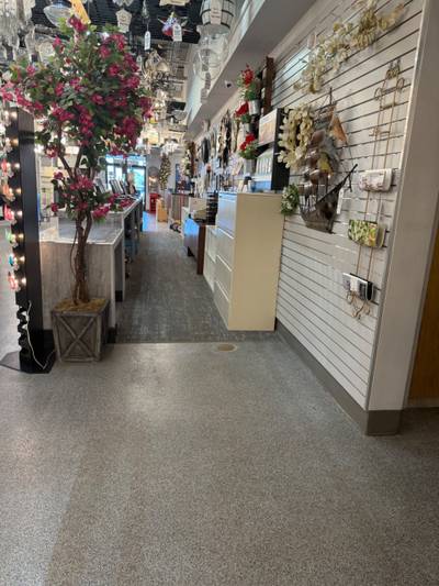 Lighting showroom aisle with hanging fixtures