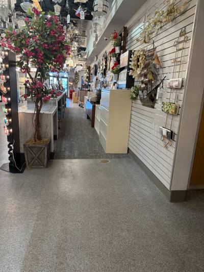 Retail lighting showroom aisle with hanging fixtures