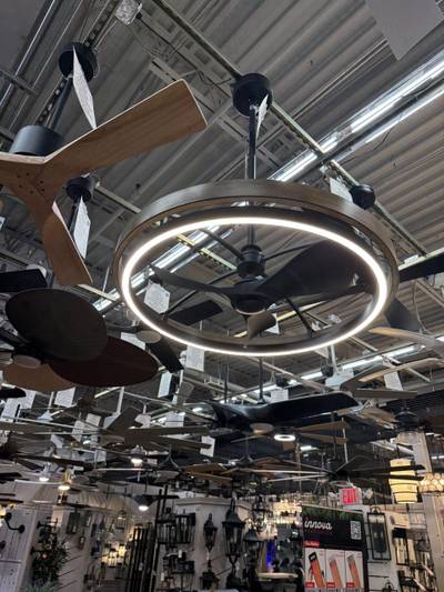 Ceiling fans and light fixtures hanging on