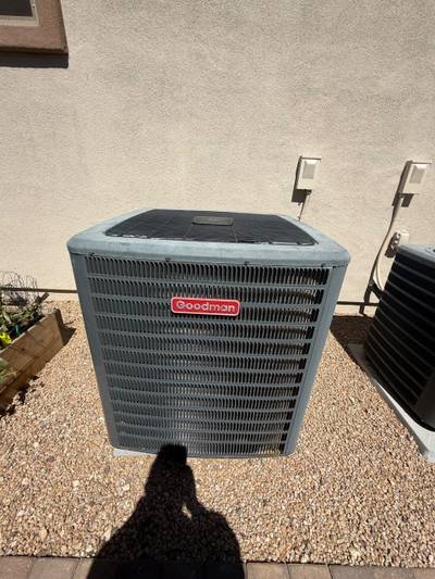 Goodman exterior AC condenser units on gravel