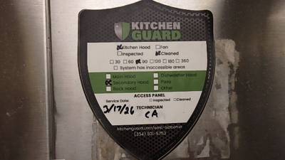 KitchenGuard hood-cleaning label, secondary hood, serviced 3/17/26