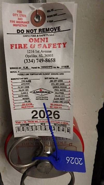 Amerex suppression/extinguisher tag with 2026 service year and blue security tie