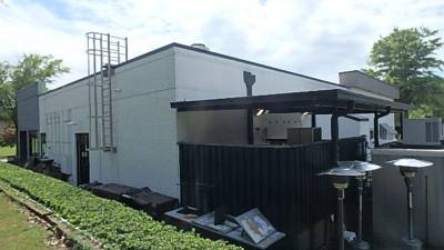 Outdoor covered patio bar with propane heaters
